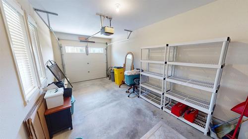26-2375 1St Street, Cranbrook, BC - Indoor Photo Showing Garage