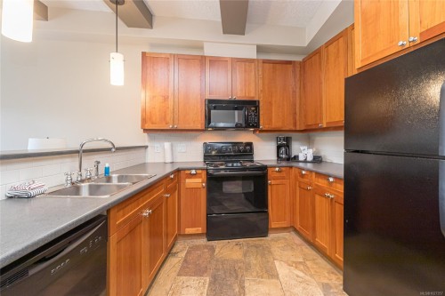 210 A-1376 Lynburne Pl, Langford, BC - Indoor Photo Showing Kitchen With Double Sink