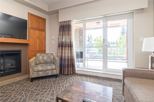 210 A-1376 Lynburne Pl, Langford, BC - Indoor Photo Showing Other Room With Fireplace