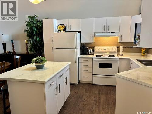 66 Eagle View Way, Elk Ridge, SK - Indoor Photo Showing Kitchen With Double Sink
