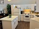 66 Eagle View Way, Elk Ridge, SK  - Indoor Photo Showing Kitchen With Double Sink 