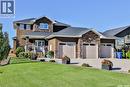200 Clubhouse Boulevard E, Warman, SK  - Outdoor With Deck Patio Veranda With Facade 