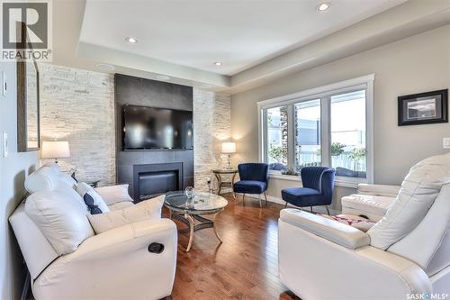 200 Clubhouse Boulevard E, Warman, SK - Indoor Photo Showing Living Room With Fireplace
