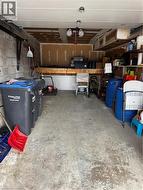 Garage with concrete block wall and a garage door opener - 