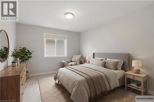 Bedroom featuring baseboards and light colored carpet - 84 Duncairn Crescent, Hamilton, ON - Indoor Photo Showing Bedroom