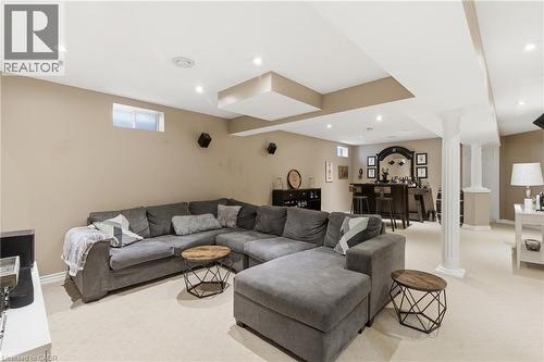 Living area with ornate columns, light colored carpet, and recessed lighting - 84 Duncairn Crescent, Hamilton, ON - Indoor