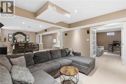 Living room with light colored carpet and recessed lighting - 84 Duncairn Crescent, Hamilton, ON - Indoor Photo Showing Living Room