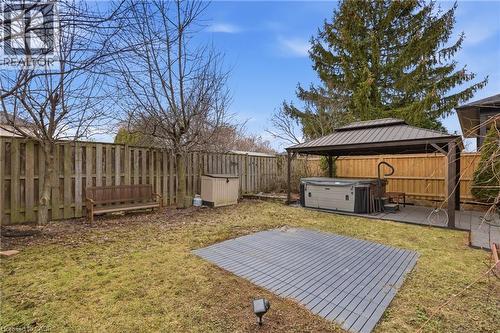 Fenced backyard featuring a gazebo and a patio - 84 Duncairn Crescent, Hamilton, ON - Outdoor