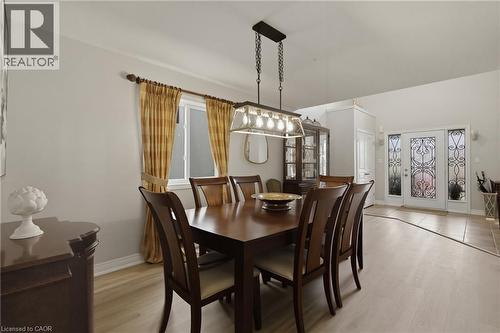 Dining area featuring light wood-style flooring and baseboards - 84 Duncairn Crescent, Hamilton, ON - Indoor Photo Showing Dining Room