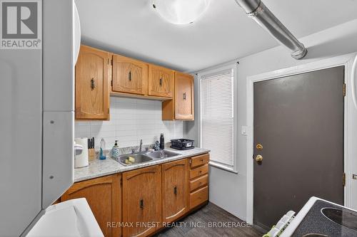 255-257 Earl Street, Kingston (Central City East), ON - Indoor Photo Showing Kitchen With Double Sink