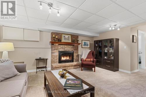 57 Meredith Drive, St. Catharines (Carlton/Bunting), ON - Indoor Photo Showing Living Room With Fireplace