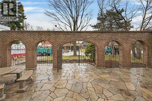 View of patio / terrace featuring a gate - 22 Woodside Drive, Hamilton, ON - Outdoor