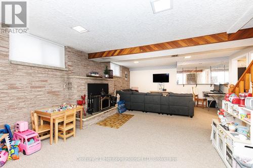 Rec Room with Wood Stove - 211 Grantham Avenue, St. Catharines (Facer), ON - Indoor With Fireplace