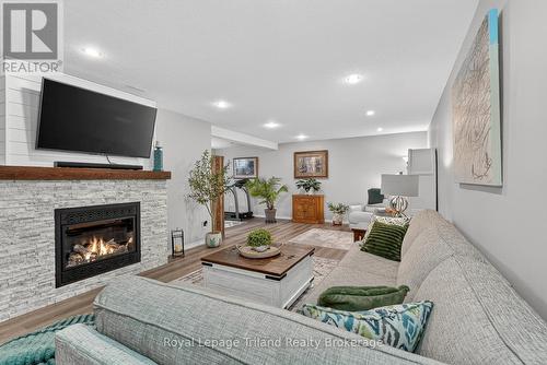 Family Room - gas fireplace - 46 Colin Avenue, Tillsonburg, ON - Indoor Photo Showing Living Room With Fireplace
