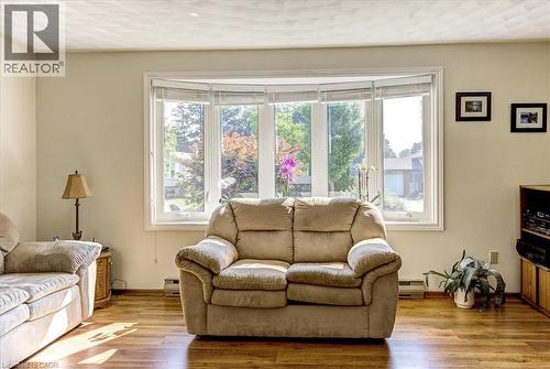Huge 5 panel window for tons of natural light. - 12 Miller Crescent, Simcoe, ON - Indoor Photo Showing Living Room
