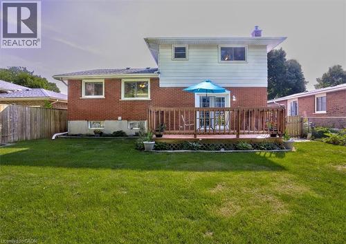 View of the back yard. - 12 Miller Crescent, Simcoe, ON - Outdoor With Deck Patio Veranda