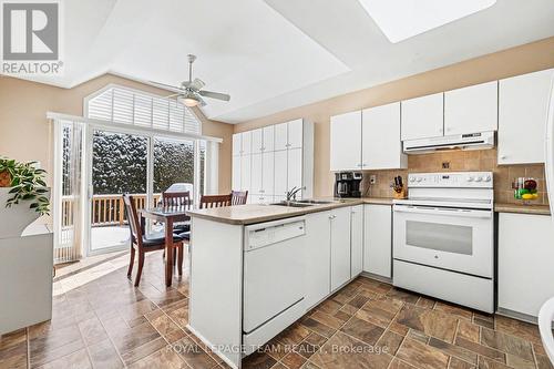 Kitchen towards Eat-in - lots of cupboards - 90 Moresby Drive, Ottawa, ON - Indoor Photo Showing Kitchen With Double Sink