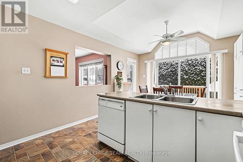 Kitchen towards Dining Room vaulted ceiling - 90 Moresby Drive, Ottawa, ON - Indoor Photo Showing Kitchen With Double Sink