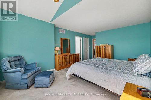 Primary Bed towards bath and walk in - 90 Moresby Drive, Ottawa, ON - Indoor Photo Showing Bedroom
