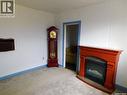 214 2Nd Street E, Lafleche, SK  - Indoor Photo Showing Living Room With Fireplace 