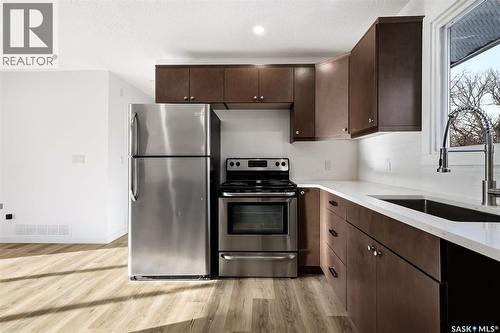 259 Broad Street N, Regina, SK - Indoor Photo Showing Kitchen With Stainless Steel Kitchen With Upgraded Kitchen