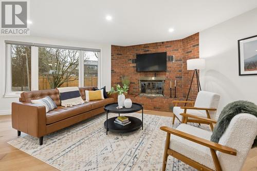 757 Westmount Road W, Kitchener, ON - Indoor Photo Showing Living Room With Fireplace