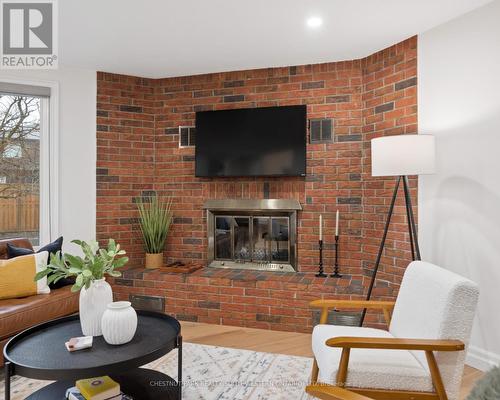 757 Westmount Road W, Kitchener, ON - Indoor Photo Showing Living Room With Fireplace