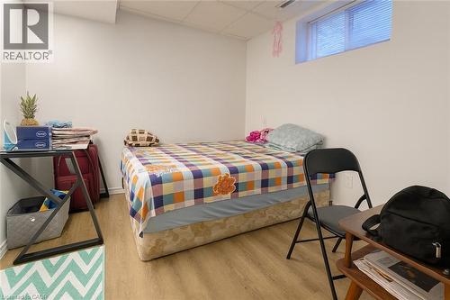 Bedroom with a drop ceiling and light wood finished floors - 988 Prosperity Court, London, ON - Indoor Photo Showing Bedroom