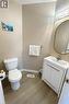 Half bathroom with vanity and light wood-style flooring - 988 Prosperity Court, London, ON  - Indoor Photo Showing Bathroom 