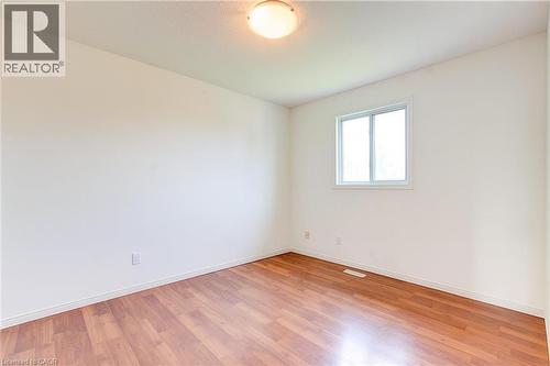 Empty room featuring light wood-style flooring and baseboards - 988 Prosperity Court, London, ON - Indoor Photo Showing Other Room