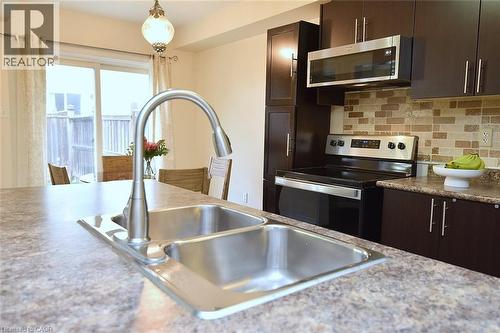 9 Lynch Crescent, Binbrook, ON - Indoor Photo Showing Kitchen With Double Sink With Upgraded Kitchen