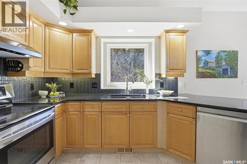355 Chotem Terrace, Saskatoon, SK - Indoor Photo Showing Kitchen With Double Sink
