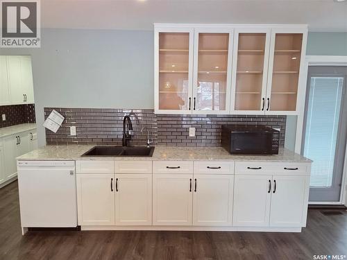 621 Mccall Street, Oxbow, SK - Indoor Photo Showing Kitchen With Double Sink