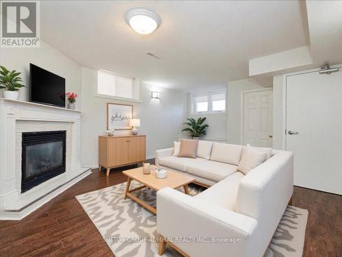 64 Copeman Crescent, Barrie, ON - Indoor Photo Showing Living Room With Fireplace