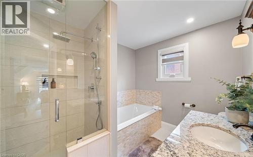 Full bathroom featuring a bath, a shower stall, and vanity - 4516 Gullfoot Circle, Mississauga, ON - Indoor Photo Showing Bathroom