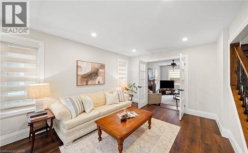 Living room featuring dark wood-type flooring, recessed lighting, and a ceiling fan - 4516 Gullfoot Circle, Mississauga, ON - Indoor Photo Showing Living Room