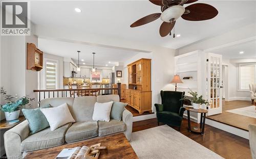 Living area featuring dark wood-type flooring, a ceiling fan, and recessed lighting - 4516 Gullfoot Circle, Mississauga, ON - Indoor Photo Showing Living Room