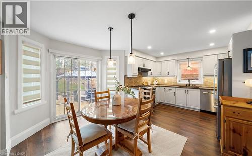 Dining space featuring dark wood-style floors and recessed lighting - 4516 Gullfoot Circle, Mississauga, ON - Indoor Photo Showing Other Room
