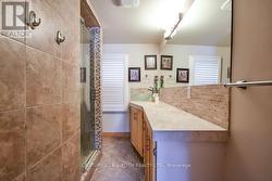 Main Floor Bathroom w/ Walk in Shower - 