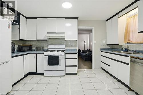 4 Hilda Street, St. Catharines, ON - Indoor Photo Showing Kitchen With Double Sink