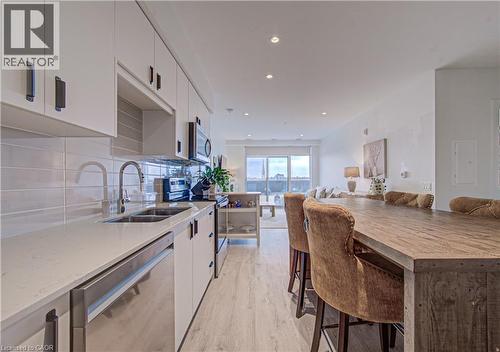 50 Grand Avenue S Unit# 609, Cambridge, ON - Indoor Photo Showing Kitchen With Double Sink