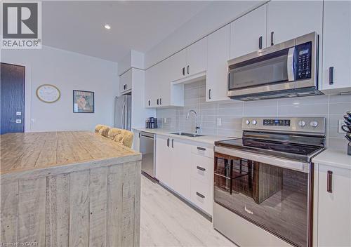 50 Grand Avenue S Unit# 609, Cambridge, ON - Indoor Photo Showing Kitchen With Double Sink
