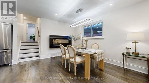 42 Devins Drive, Aurora, ON - Indoor Photo Showing Dining Room With Fireplace