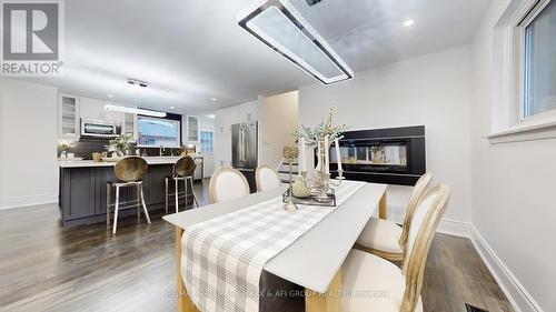 42 Devins Drive, Aurora, ON - Indoor Photo Showing Dining Room With Fireplace