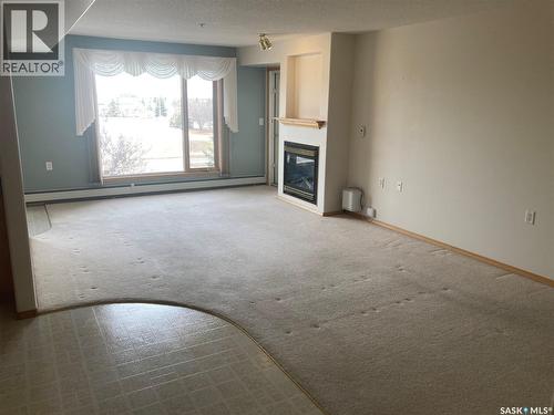 329 325 Keevil Crescent, Saskatoon, SK - Indoor With Fireplace