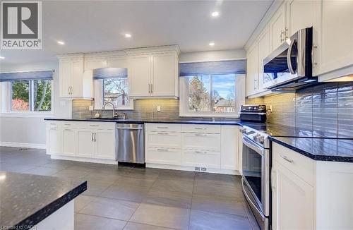 Oh, what a kitchen! Hands-free faucet is soooo handy. - 63 Kingston Crescent, Kitchener, ON - Indoor Photo Showing Kitchen With Upgraded Kitchen