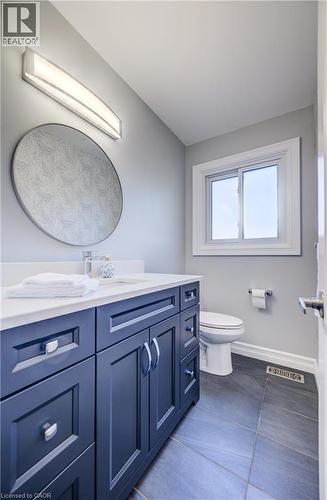 2-piece between kitchen and family room. - 63 Kingston Crescent, Kitchener, ON - Indoor Photo Showing Bathroom