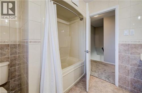Durable and hygienic acrylic tub/shower combo. - 63 Kingston Crescent, Kitchener, ON - Indoor Photo Showing Bathroom