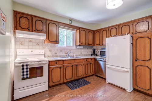 107 Nicole Boulevard, Tiny, ON - Indoor Photo Showing Kitchen With Double Sink