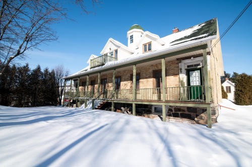 Front of Structure - 309 Rue Taché, Saint-Pascal, QC - Outdoor With Deck Patio Veranda
